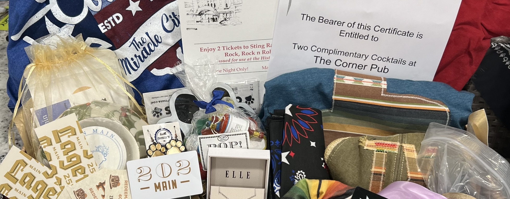 Shirt, Koozie, and Raffle Purchases